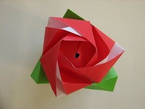 Magic Rose Cube by Valerie Vann: http://www.youtube.com/watch?v=E2Yr_SIXkVo&feature=related PDFs: http://www.scribd.com/doc/501531/Magic-Rose-Cube-1 http://www.scribd.com/doc/501533/Magic-Rose-Cube-2 http://www.scribd.com/doc/501530/Magic-Rose-Cube-3
