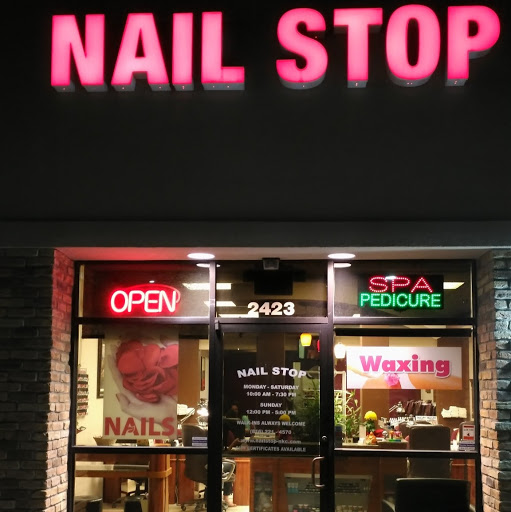 Nail Stop Salon & Spa logo