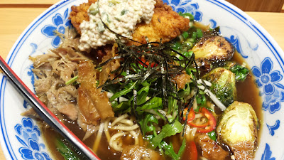 Boke BowlDuck ramen which is a winter special ramen, seasonal veggies are the Brussels sprouts and butternut squash. I upgraded the ramen with the add in of fried chicken with their orange dot sauce, pickled mustard seeds in an aioli base sauce