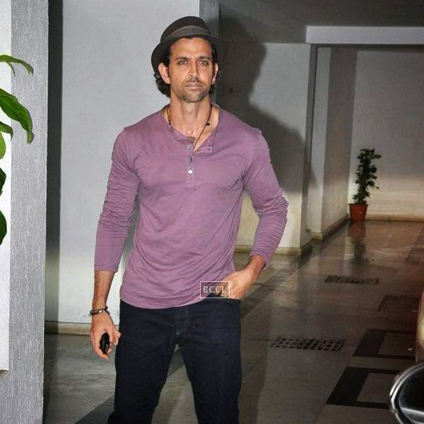 Hrithik Roshan leaves after attending Karan Johar's party, organised at his residence, on July 26, 2014.(Pic: Viral Bhayani)