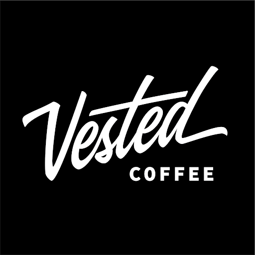 Vested Garment District Coffee logo