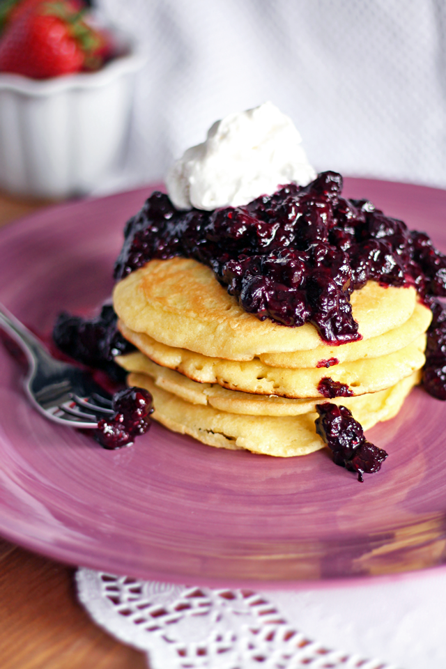 Almond Meal Pancakes with Berry Reduction and Coconut Cream from dontmissdairy.com