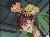Sanosuke and Yahiko stand by and casually watch Kenshin being mauled.