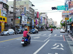 motorbikes and cars on Zhongyang Road in Tucheng District, New Taipei City