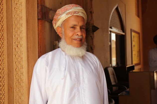 Elderly Omani Man at the entrance of Jabreen Castle, near Nizwa, Oman