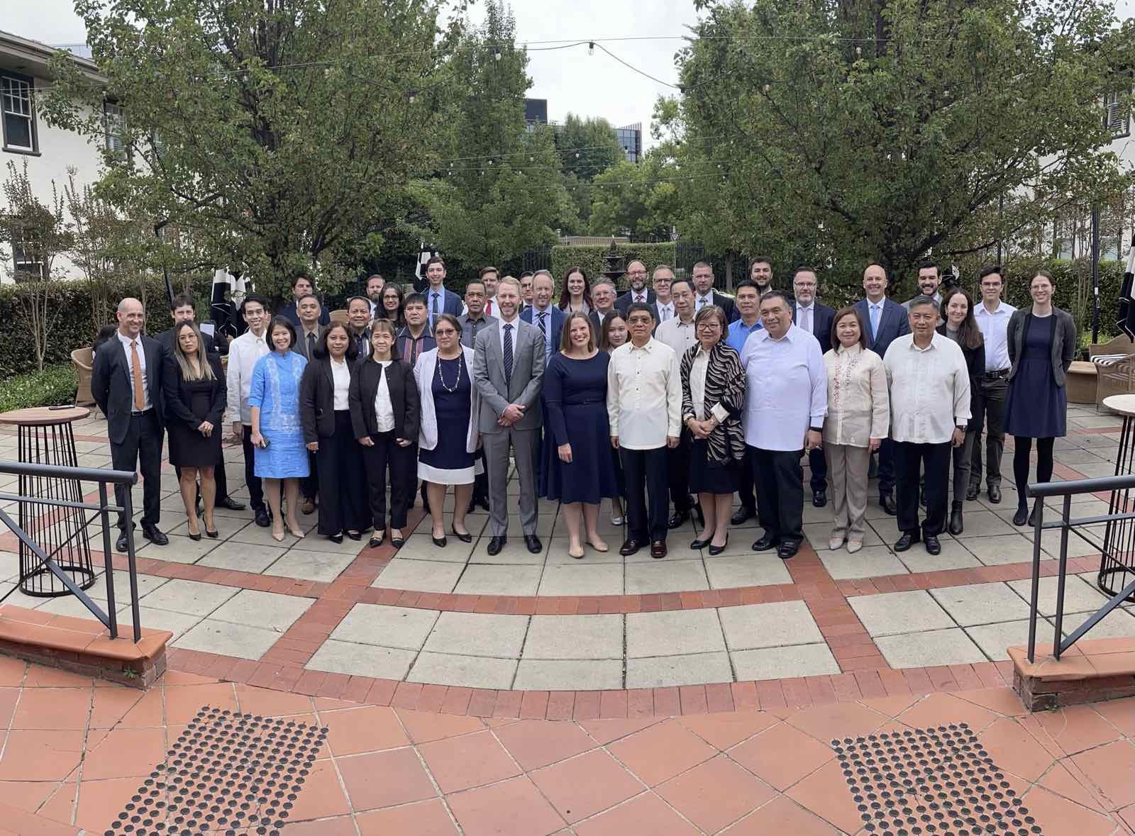 A group of people posing for a photo

Description automatically generated with medium confidence
