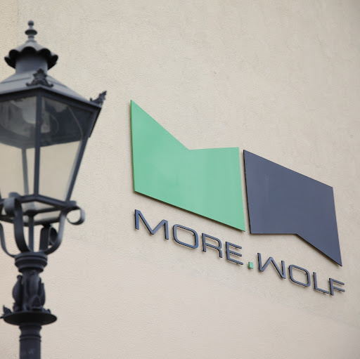 More Wolf Einrichtungen GmbH / Wohnen + Küche logo