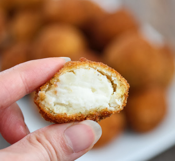 close-up photo of a Fried Mashed Potato Ball sliced in half
