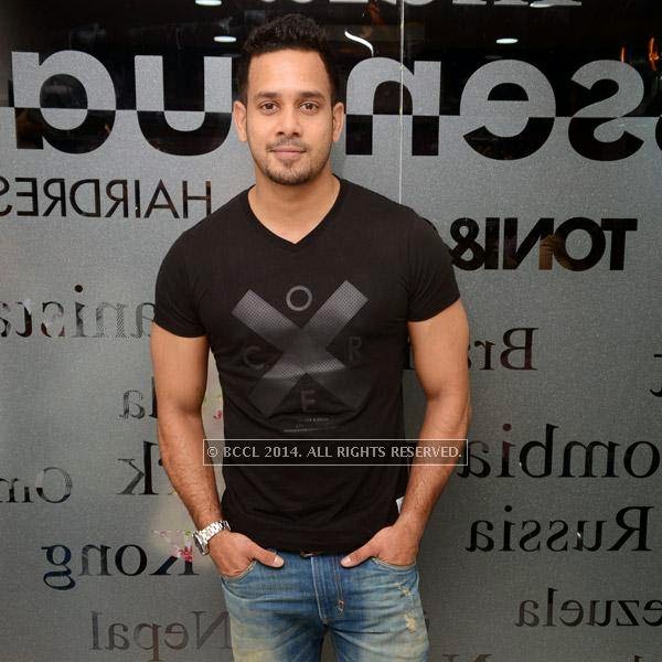 Actor Bharath poses for the lens as he arrives to at the launch of salon 'Essensuals', in Chennai.