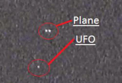 Spherical Foo Fighter Ufo Captured Flying Along Side Plane