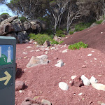 Arrow marker in red sands bay (103069)
