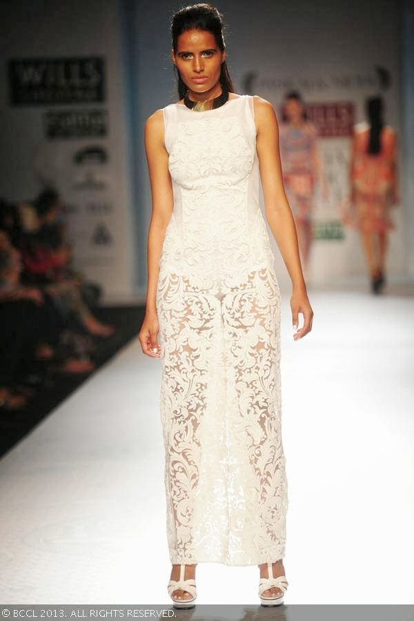 Preeti walks the ramp for designer duo Pankaj and Nidhi on Day 2 of the Wills Lifestyle India Fashion Week (WIFW) Spring/Summer 2014, held in Delhi.