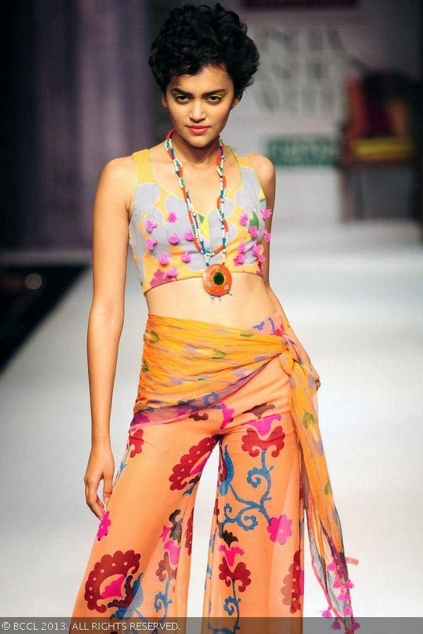 Shweta Dolli flaunts a creation by fashion designer Anupama Dayal on Day 1 of Wills Lifestyle India Fashion Week (WIFW) Spring/Summer 2014, held in Delhi.