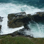 Waves crashing against rocks at Bogey Hole (341332)