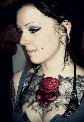 skull tattoo on girl's chest