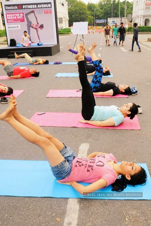 Participants at the yoga session during the Raahgiri Day, in Delhi.