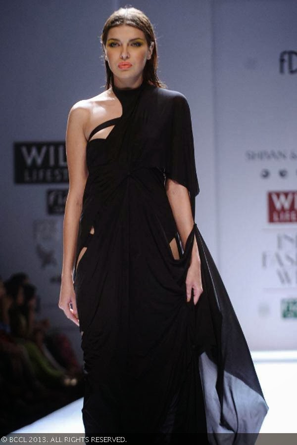 Katrin walks the ramp for fashion designers Shivan & Narresh on Day 2 of the Wills Lifestyle India Fashion Week (WIFW) Spring/Summer 2014, held in Delhi.