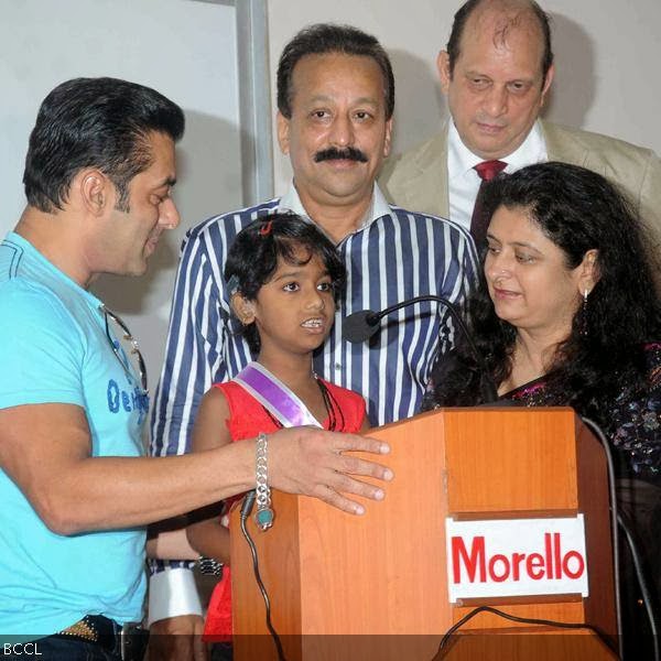 Salman Khan with Baba Siddiqui (C) during a charity event, held at Holy Family Hospital, in Mumbai, on October 11, 2013. (Pic: Viral Bhayani)