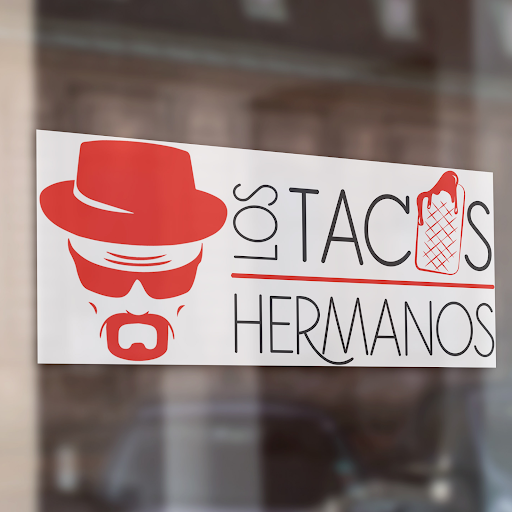 Los Tacos Hermanos logo