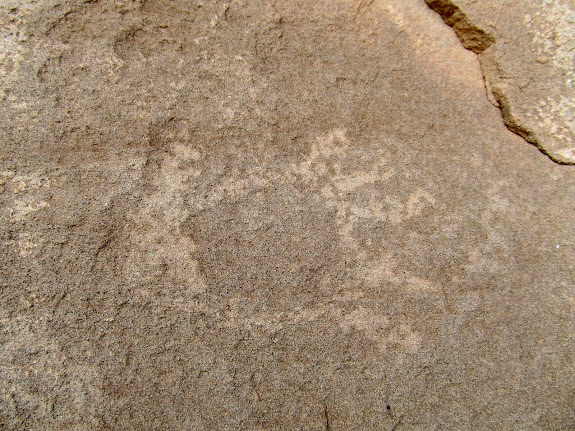 Faint bear print petroglyph