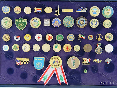 Emphasize your corporate culture and strengthen your employees' commitment to follow your culture by distributing pins, name tags and key holders incorporating your company logo, slogan and other text to your employees. Our badges, pins and key holders also serve as excellent items for promoting your institution or company in events such as expositions and seminars; they are very affordable in price. Your text and logos can easily be incorporated into the designs you choose. Our Pins are etched or minted from brass, finished to meet customer satisfaction.