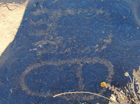Human and bear footprint petroglyphs