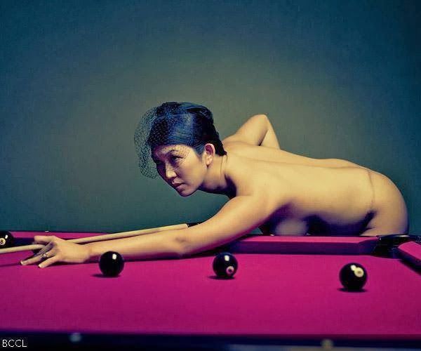 American pool player Jeanette Lee bares all during a shoot for a magazine. 