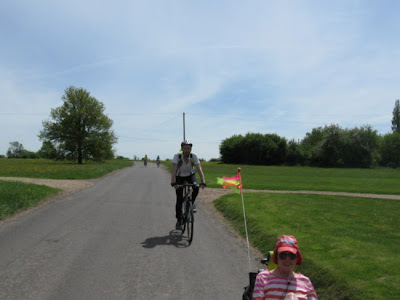 cyclists crossing village green