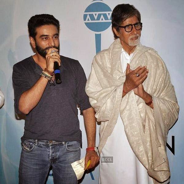 Shekhar Ravjiani speaks as Amitabh Bachchan looks on during the launch of former's new single 'Hanuman Chalisa', held at PVR on July 29, 2014.(Pic: Viral Bhayani)