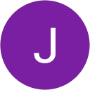 J E