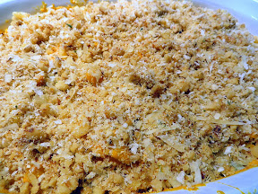 Pumpkin Mac and Cheese Recipe: After making the cheese sauce, stir it into the pasta until well mixed, then pour into a baking dish and top with a mix of parmesan, walnut, panko and breadcrumbs