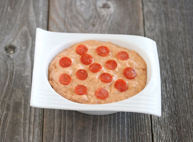 photo of pizza dip in a serving bowl