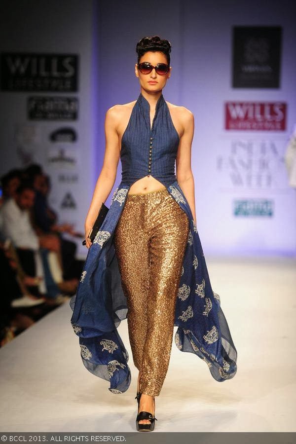 Kanishtha Dhankar showcases a creation by fashion designers Ashish Viral and Vikrant on Day 5 of Wills Lifestyle India Fashion Week (WIFW) Spring/Summer 2014, held in Delhi.