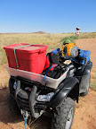 ATV loaded with raft and rappelling gear