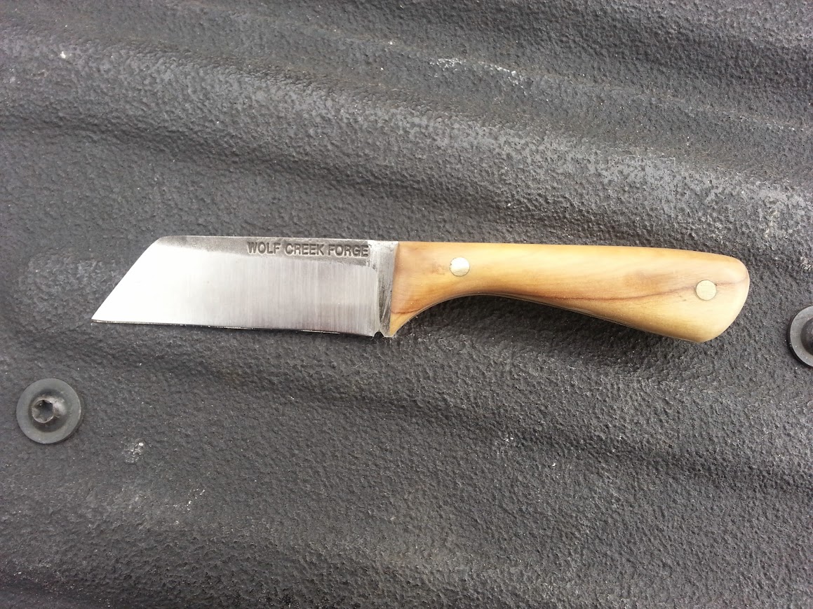 Wolf Creek Forge with rogue sanding marks