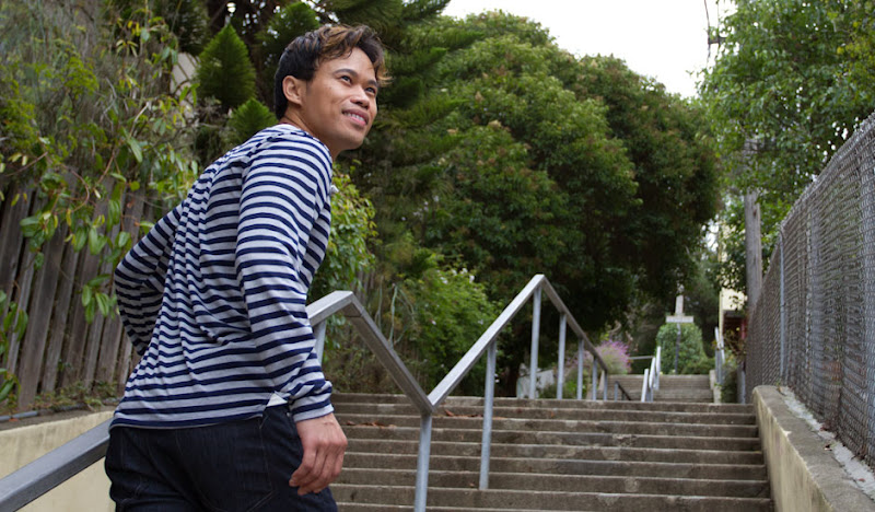 Blue Henley going up stairs