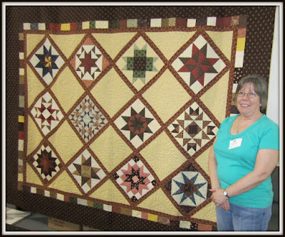 Lynn Nelson from Elkhart won the Civil War Stars raffle quilt