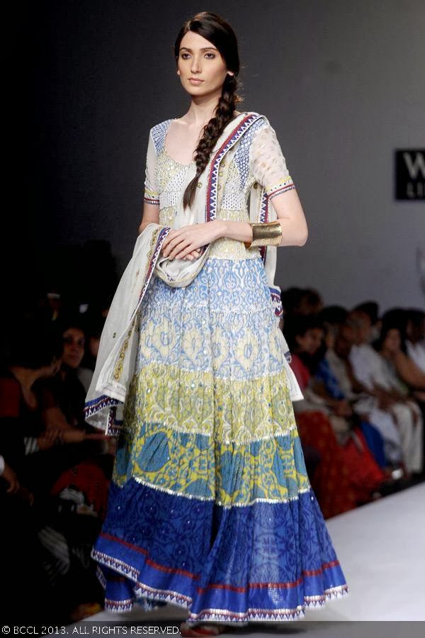 Lekha showcases a creation by fashion designer Poonam Dubey on Day 4 of Wills Lifestyle India Fashion Week (WIFW) Spring/Summer 2014, held in Delhi.