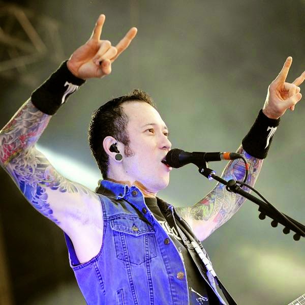 Matt Heafy, member of the US group Trivium, gestures as he performs during a concert at the Hellfest Heavy Music Festival on June 20, 2014 in Clisson, western France.