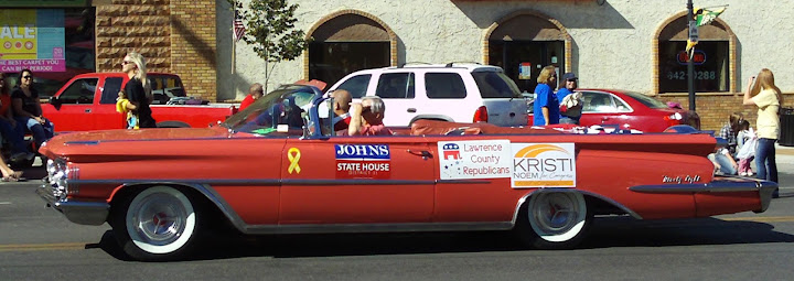 Rep.-Elect Tim Johns rides in the Swarm Days parade, Spearfish, SD, September 22, 2012
