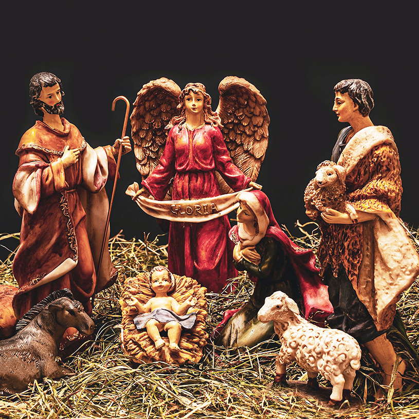 Nativity scene with baby Jesus, Mary, Joseph, angel, shepherd and sheep figures