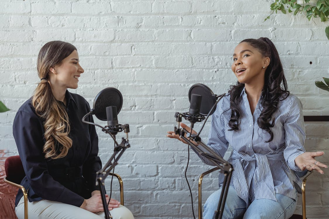 Two girls doing a podcast