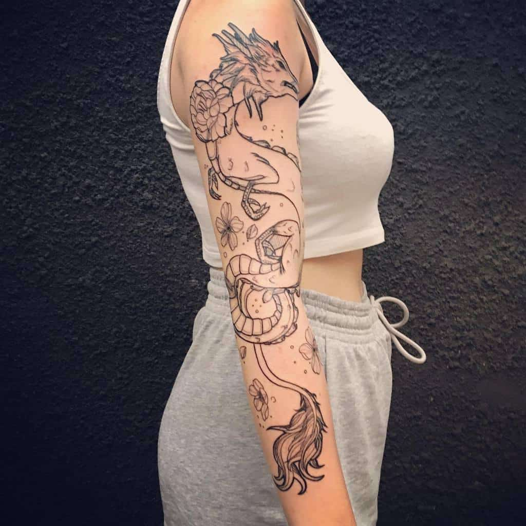 lady rocking dragon full tattoo sleeve