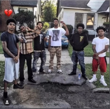 A group of people standing outside
Description automatically generated with low confidence