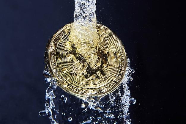 Premium Photo | Bitcoin coin in water splash money laundering concept
