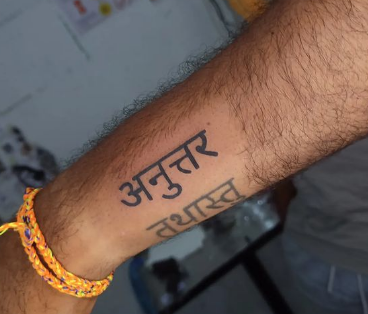 Wrist Sanskrit Wording Tattoo