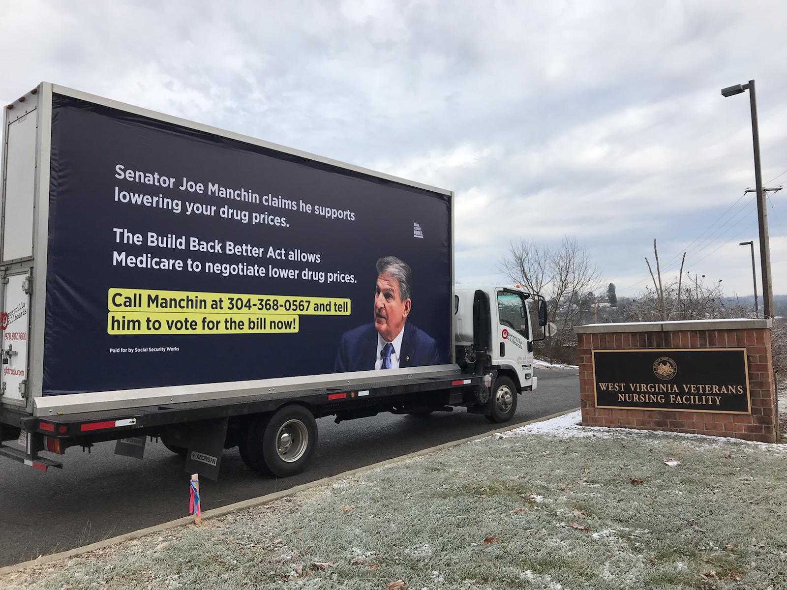 Image of a billboard truck in front of the WV veteran's nursing facility
