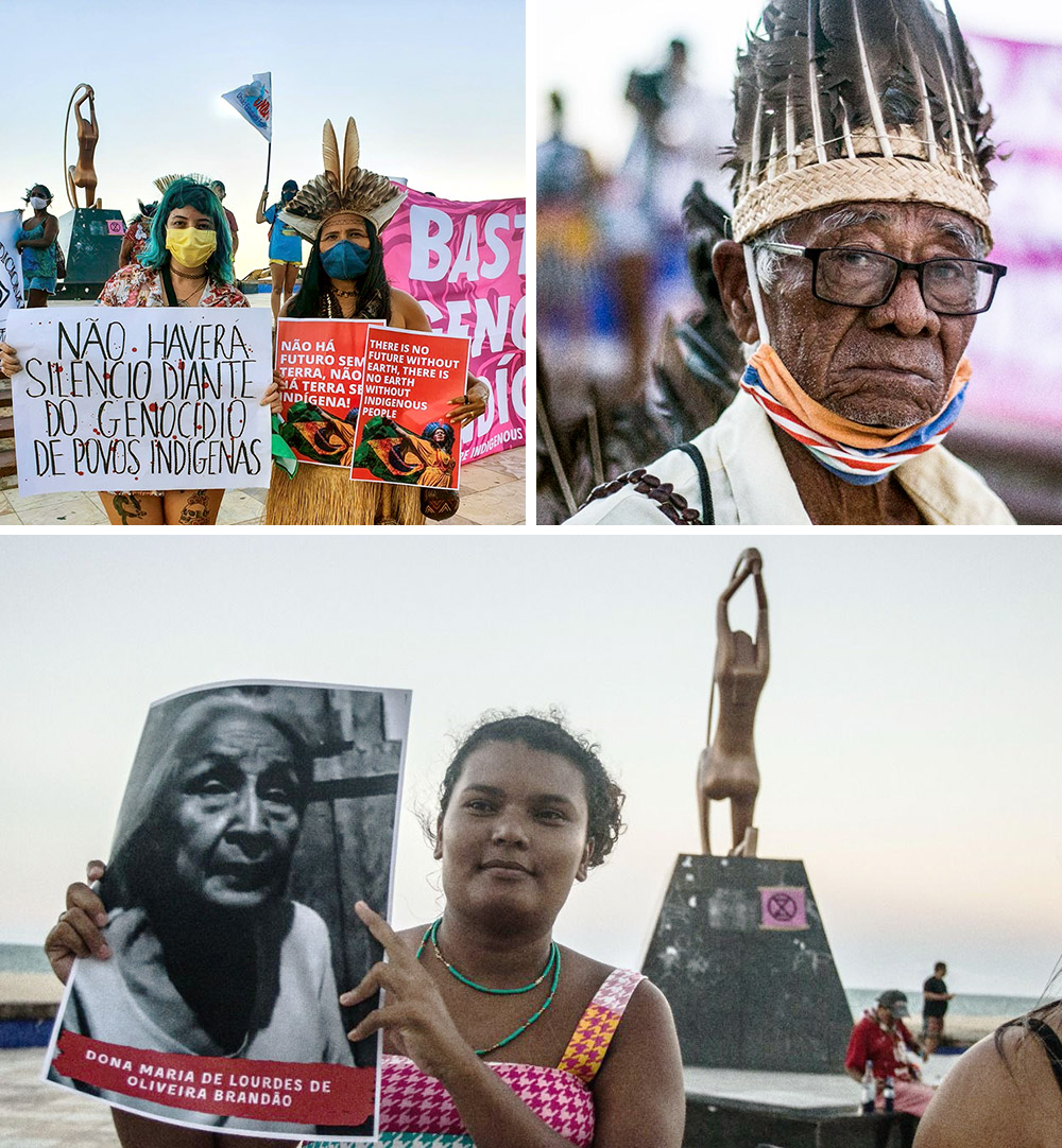 A rebel and idigenous woman stand together with stand, a close up of an elderly indigenous man, a young woman holds the portrait of an old idigneous woman in front of a gold statue on a beachfront.