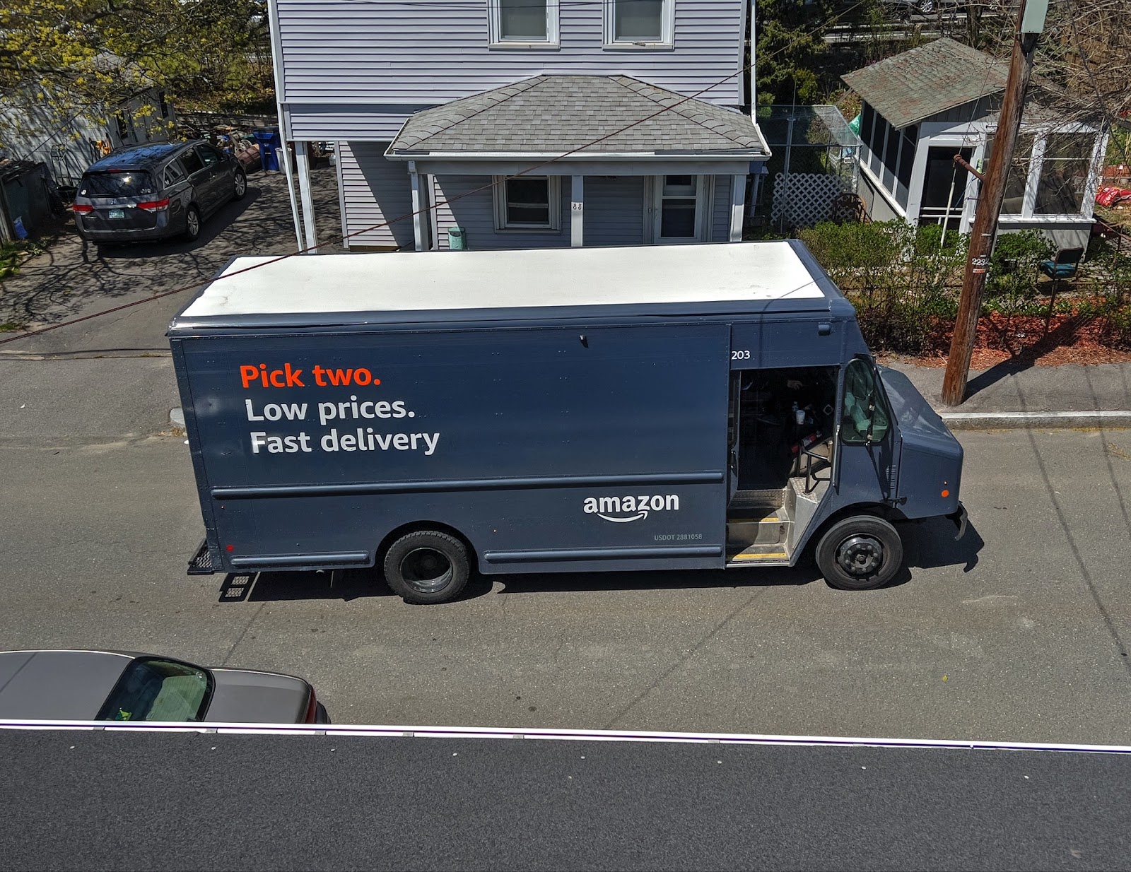 an Amazon Prime delivery truck on the street