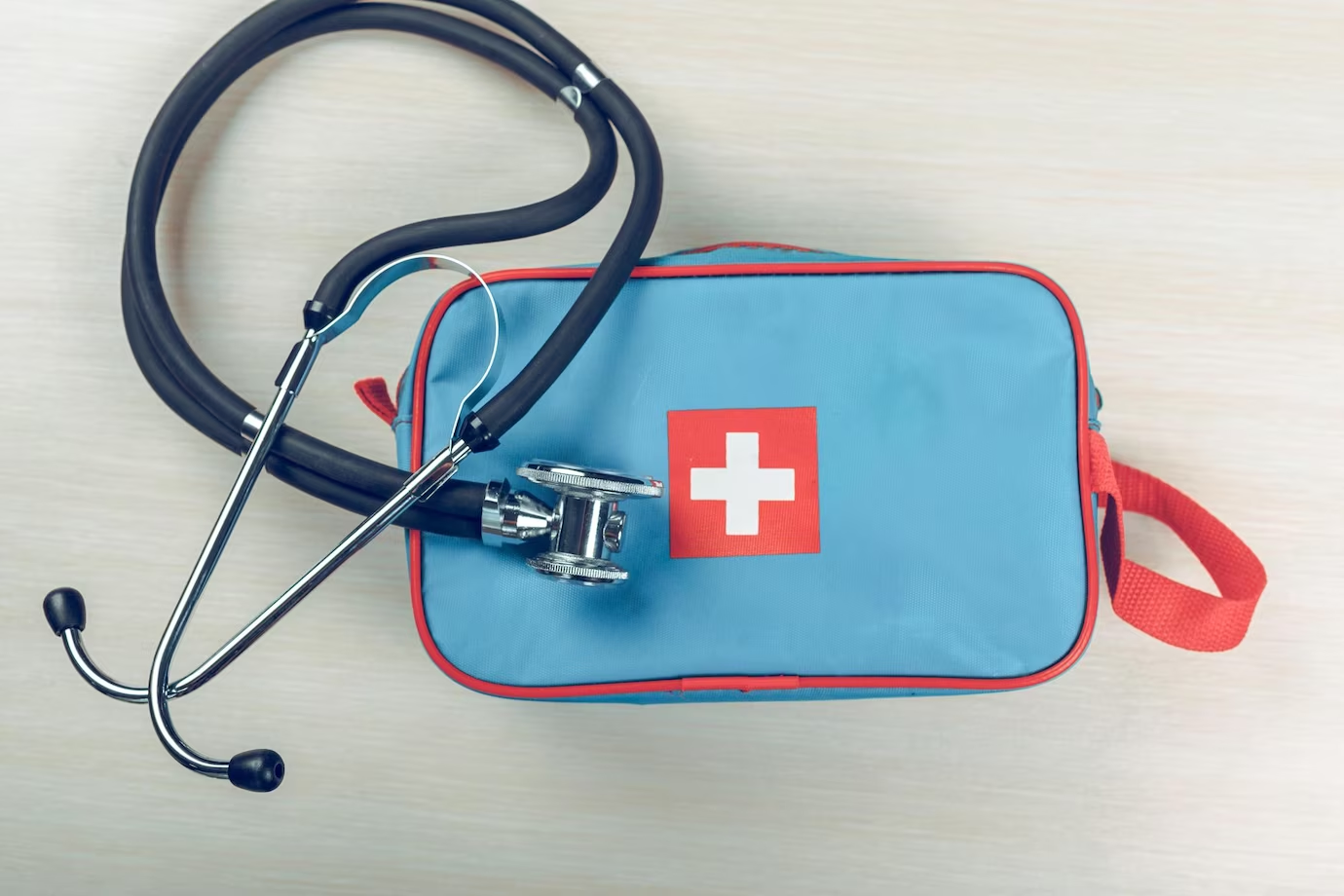 A well-equipped first aid kit symbolises preparedness's importance in Paramedic Science studies.